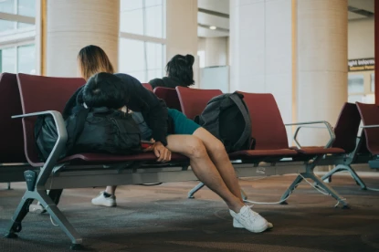 person sleeping in airport