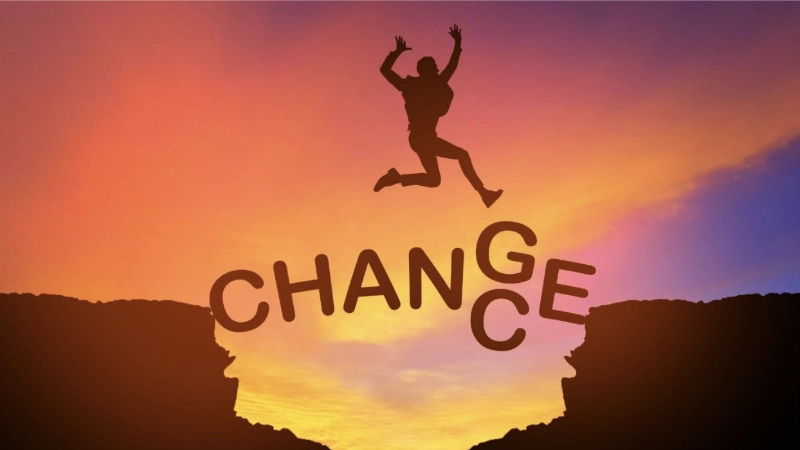 person jumping over chasm change-chance